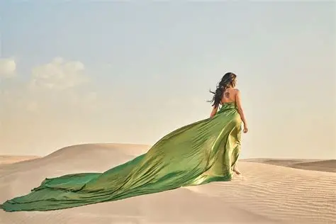 Professional photoshoot in Dubai desert with flying dress.
