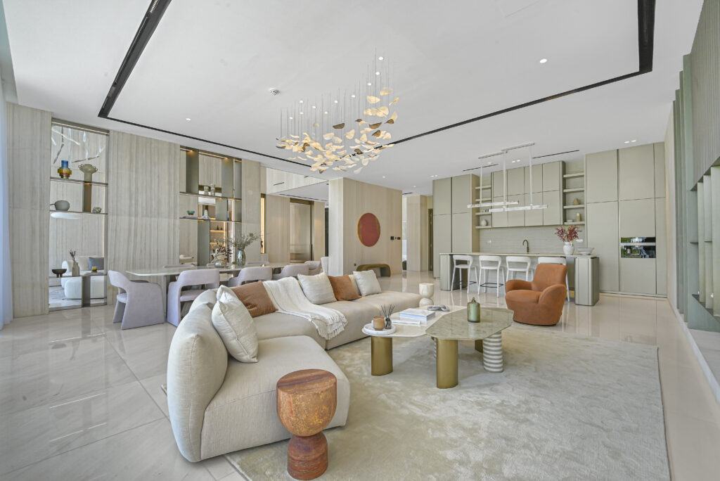 Top Benefits of Hiring the Best real estate photographer in Dubai shooting a luxury living room interior with natural light and wide-angle lens