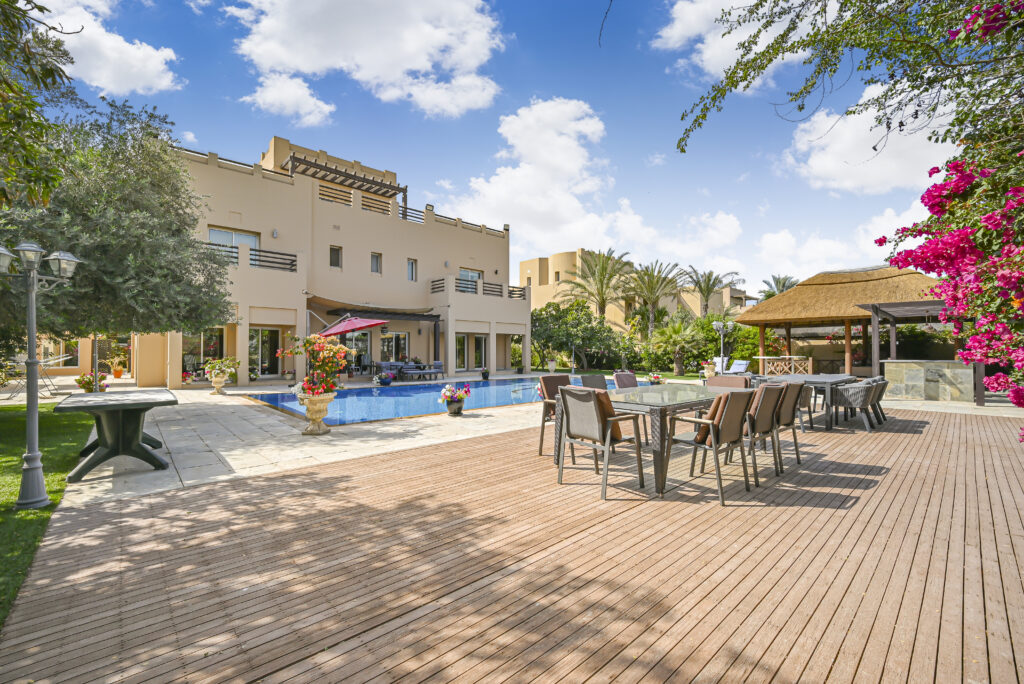 Best Photography Services for holiday homes in Dubai – Zypix Photography capturing stylish living room with pool view