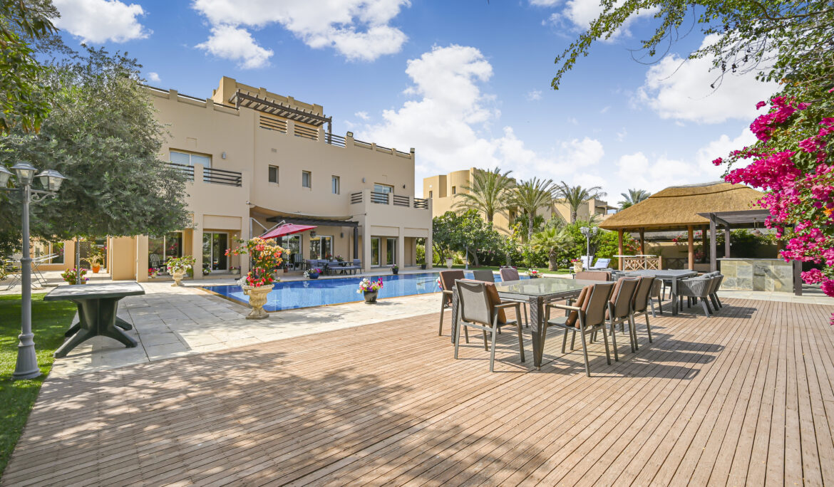 Best Photography Services for holiday homes in Dubai – Zypix Photography capturing stylish living room with pool view